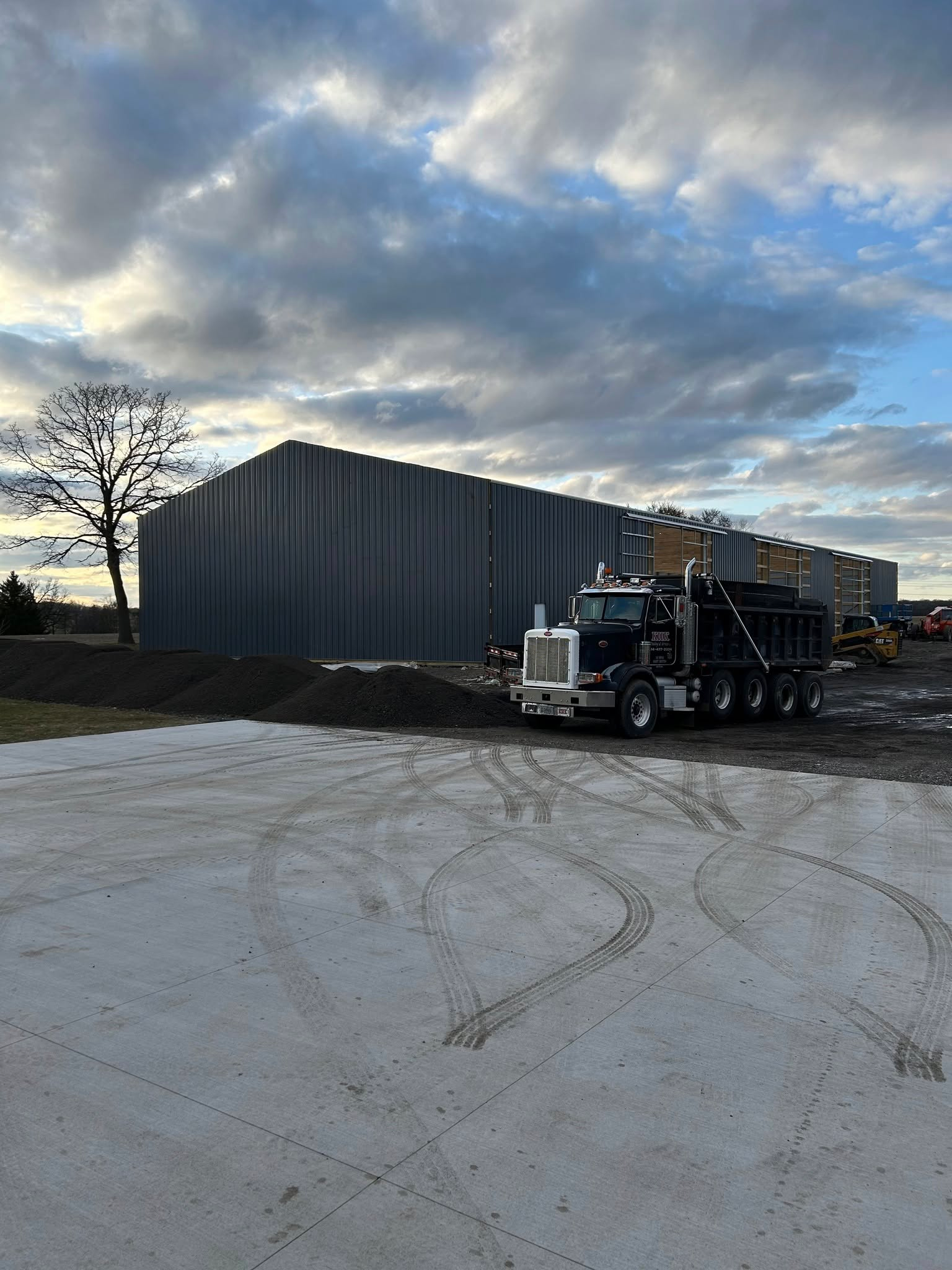 Crushed recycled asphalt delivered for a pole barn driveway in Muskego, WI